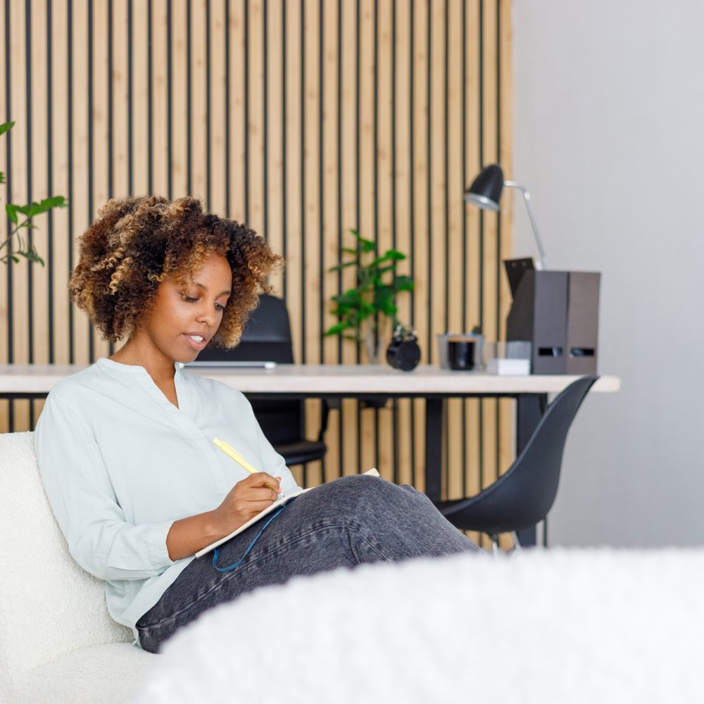 thoughtful African-American female psychologist leads the reception. mental health and moral support